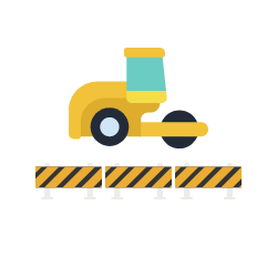 yellow steam roller with barricades