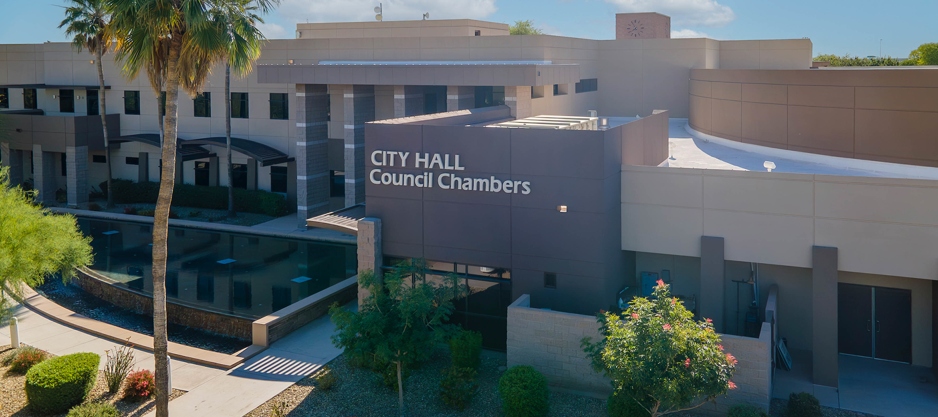2024 Aerial view of Avondale City Hall building with palm tree and bushes
